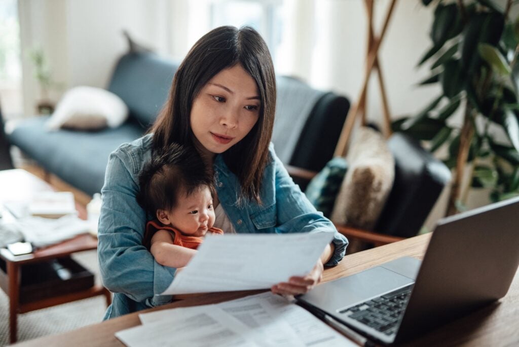 Mother Working With Baby