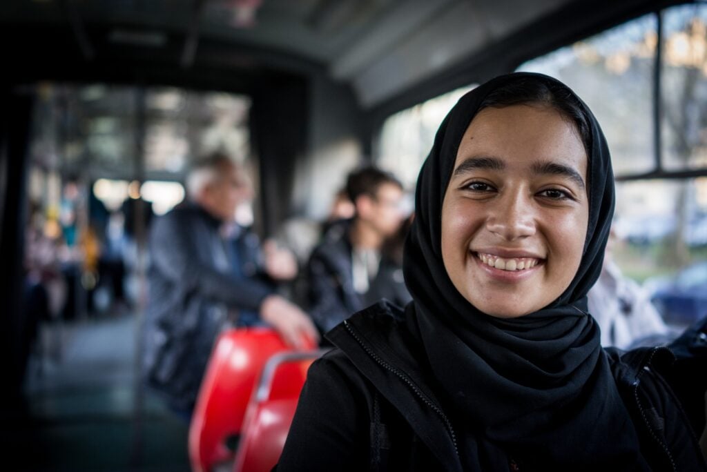 Girl Smiling On Train